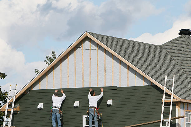 Professional Emergency Siding Repair technician working in Wayne, OH
